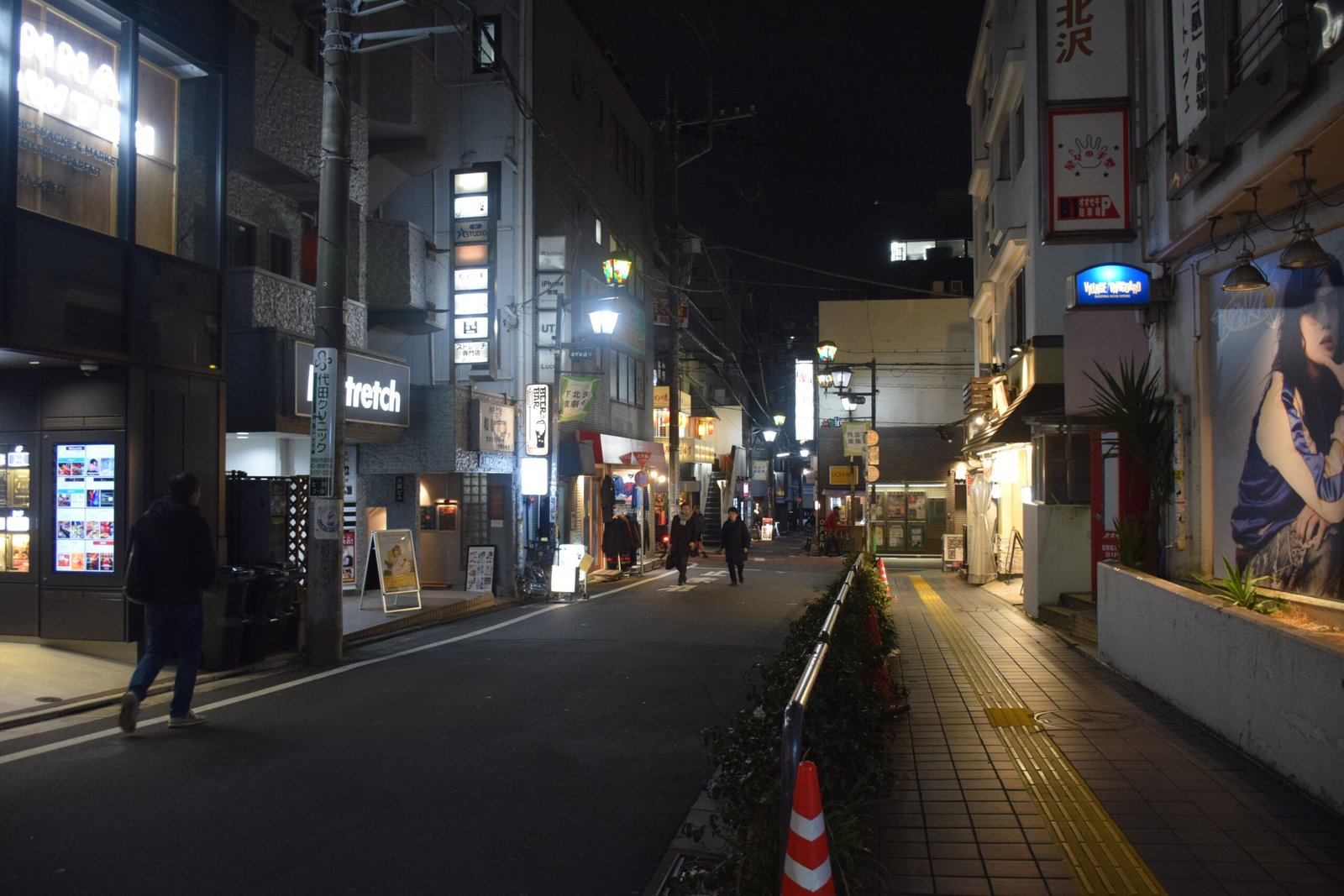 Shimokitazawa street in Tokyo with shops and pedestrians